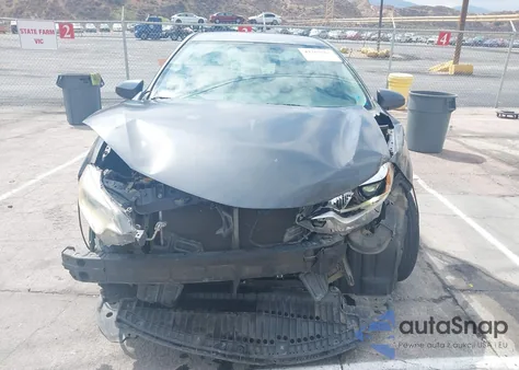 2016 Toyota Corolla L z USA, uszkodzony, nr VIN 5YFBURHE7GP396882